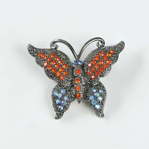 Brosa fluture cu pietre rosii si albastre imagine