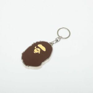 A BATHING APE Ape Head Bottle Opener Brown imagine