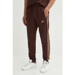 adidas pantaloni de trening din bumbac Essentials culoarea maro, cu imprimeu, IW7681 imagine