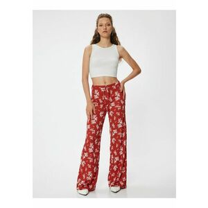 Pantaloni cu croiala ampla si model floral imagine