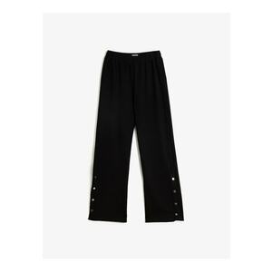 Pantaloni relaxed fit cu detalii cu capse imagine