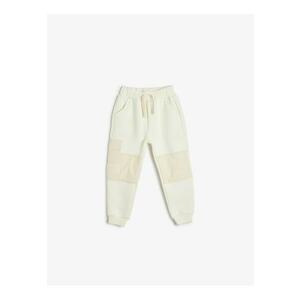 Pantaloni de trening cu croiala conica si snur de ajustare in talie imagine