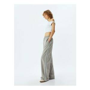 Pantaloni cu croiala ampla si buzunare laterale imagine
