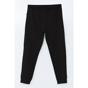 Pantaloni de trening din amestec de bumbac cu croiala conica imagine