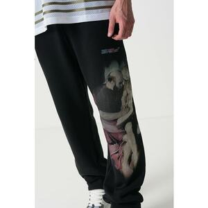 Pantaloni de trening cu design grafic imagine