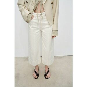 Blugi crop cu croiala ampla si cusaturi frontale imagine
