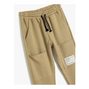 Pantaloni de trening cu snur de ajustare si slituri cu fermoar imagine
