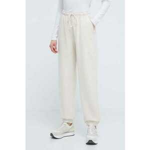 New Balance pantaloni de trening din bumbac culoarea bej, neted imagine