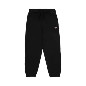 Diesel pantaloni de trening din bumbac pentru copii PGINND TROUSERS culoarea negru, neted, J02235 imagine