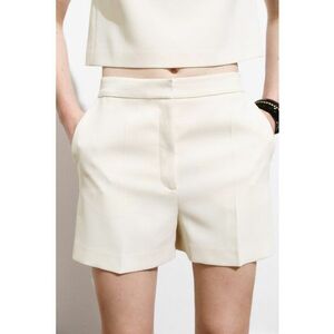 Pantaloni scurti cu buzunare oblice imagine