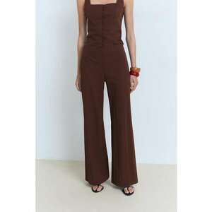 Pantaloni cu croiala ampla si model uni imagine