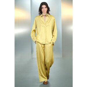 Pantaloni vaporosi cu snur si aplicatii imagine