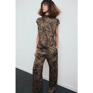 Pantaloni cu croiala ampla si animal print - Negru/Maro/Maro camel imagine
